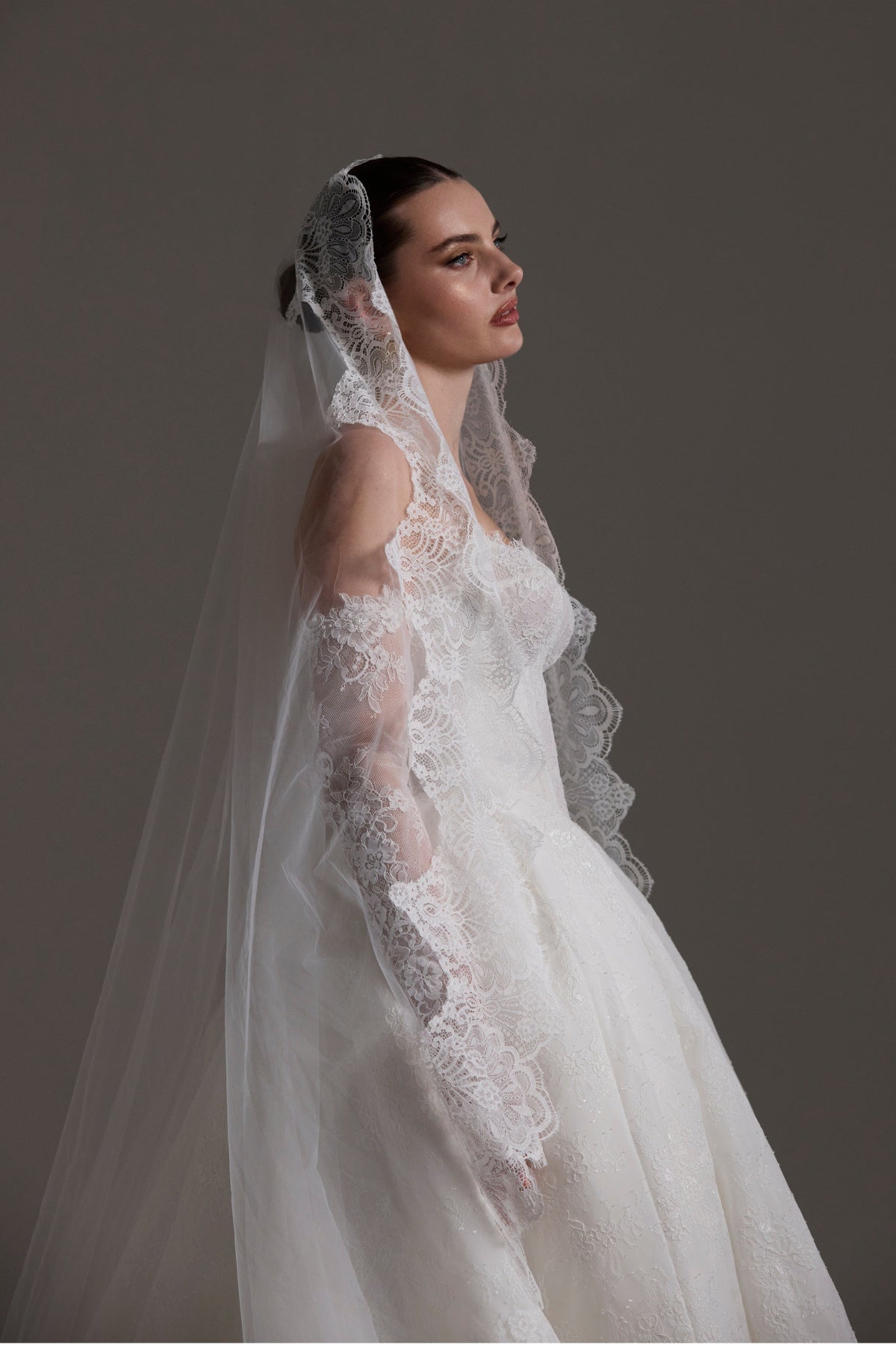 Mantilla lace veil for chapel weddings, vintage romance vibes.