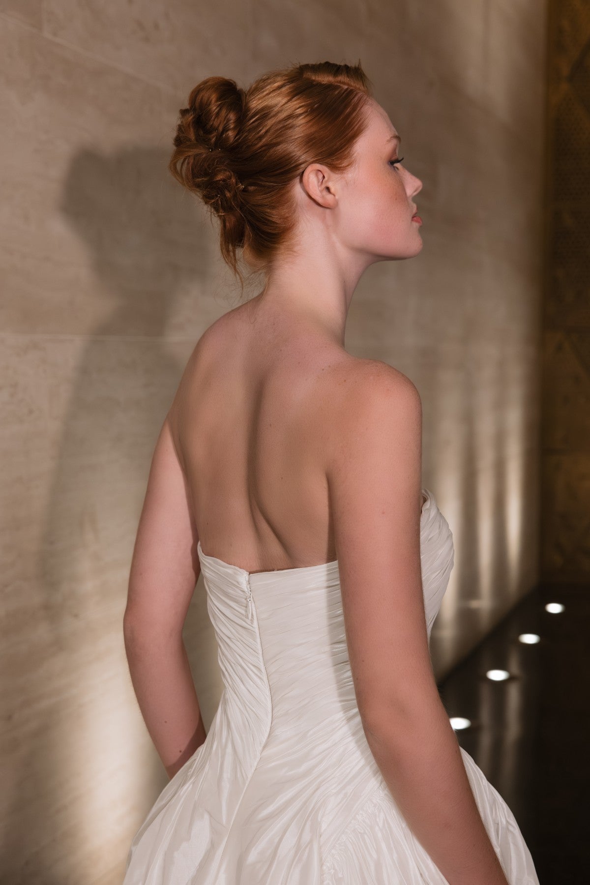 RHEA strapless sweetheart textured taffeta A-line wedding dress, back profile close-up, by Atelier Wu