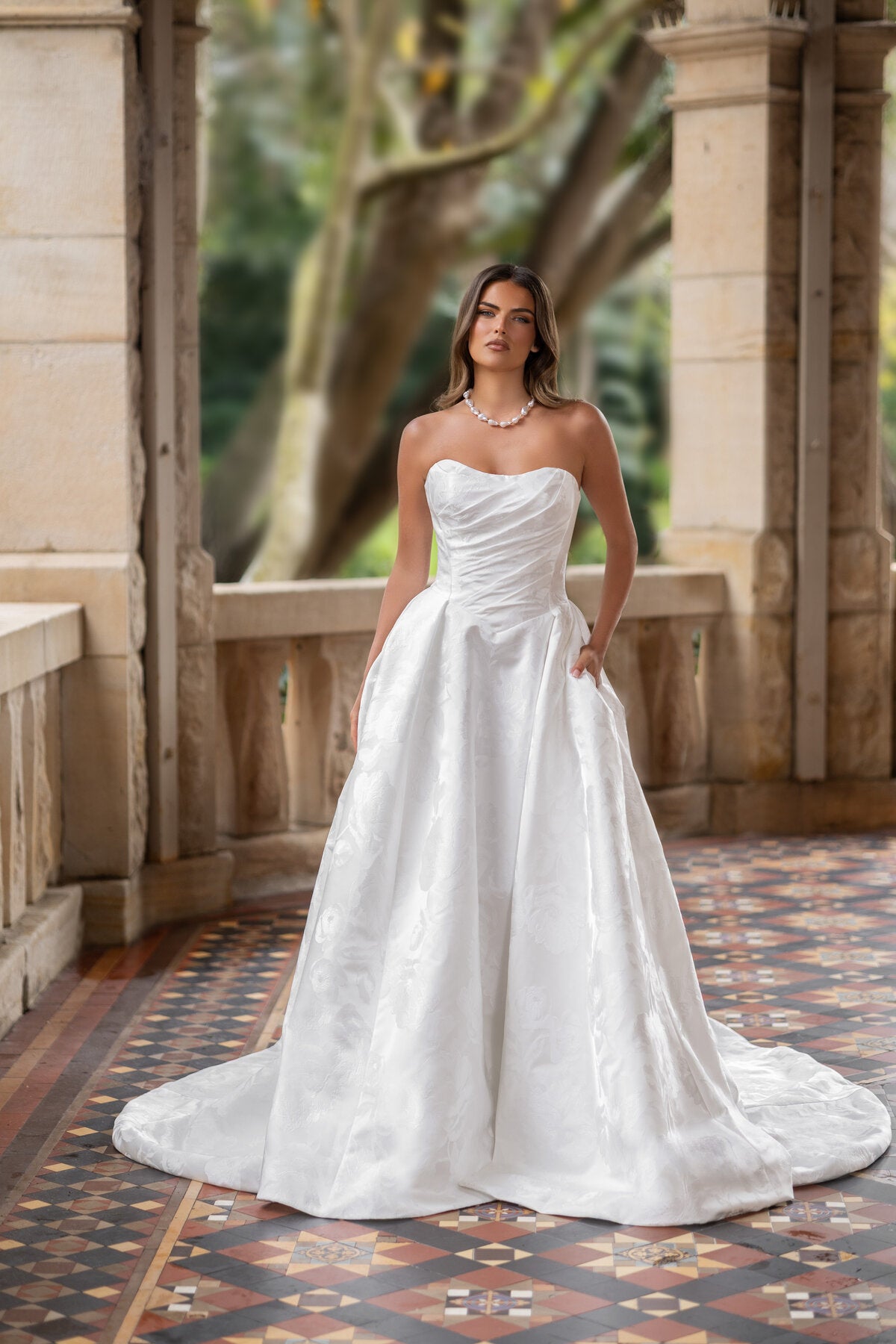 ATLANTA strapless floral jacquard A-line wedding dress with draped bodice and high leg slit by Jessica Couture