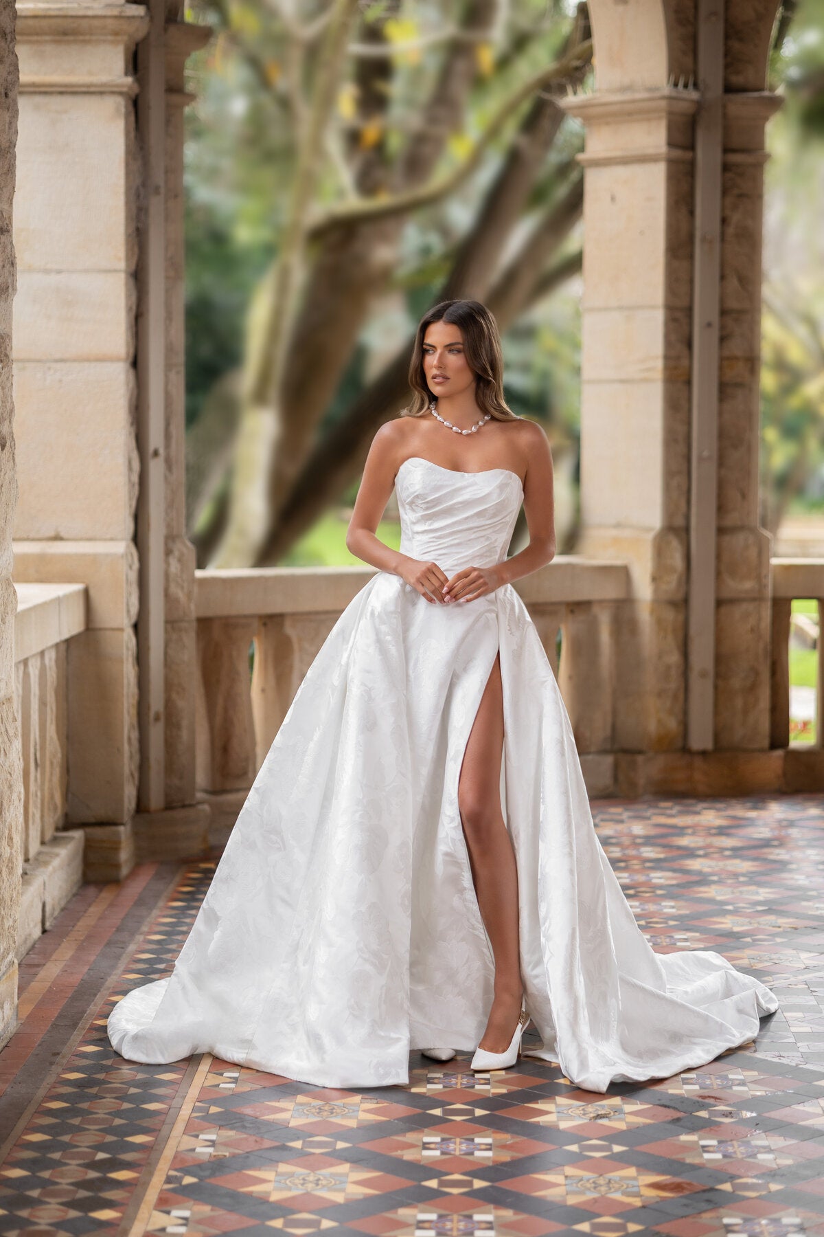ATLANTA strapless floral jacquard A-line wedding dress with draped bodice and high leg slit by Jessica Couture