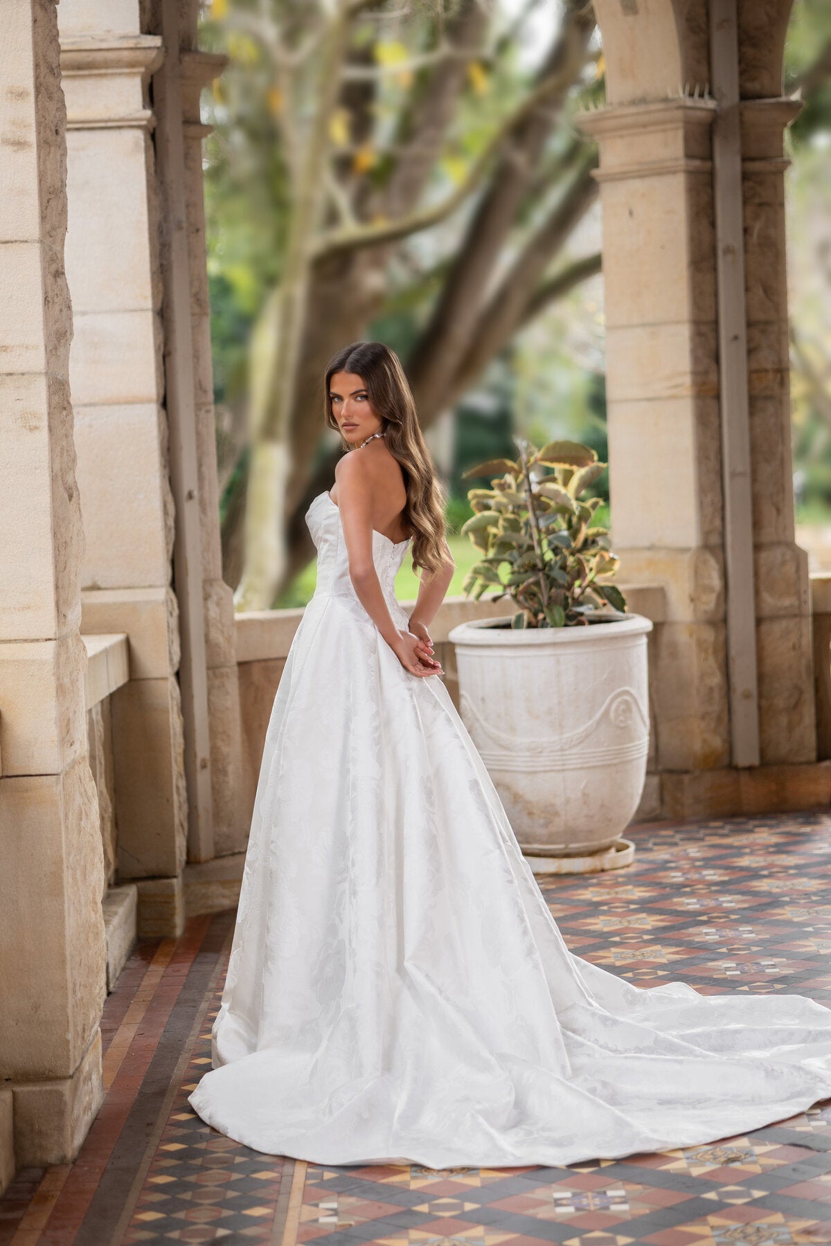 ATLANTA strapless floral jacquard A-line wedding dress with draped bodice and high leg slit by Jessica Couture