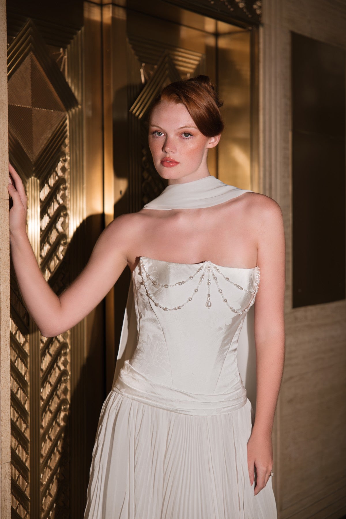 AURELLIA strapless beaded chain-draped satin and chiffon A-line wedding dress, close-up of the beaded chain-draped bodice, by Atelier Wu