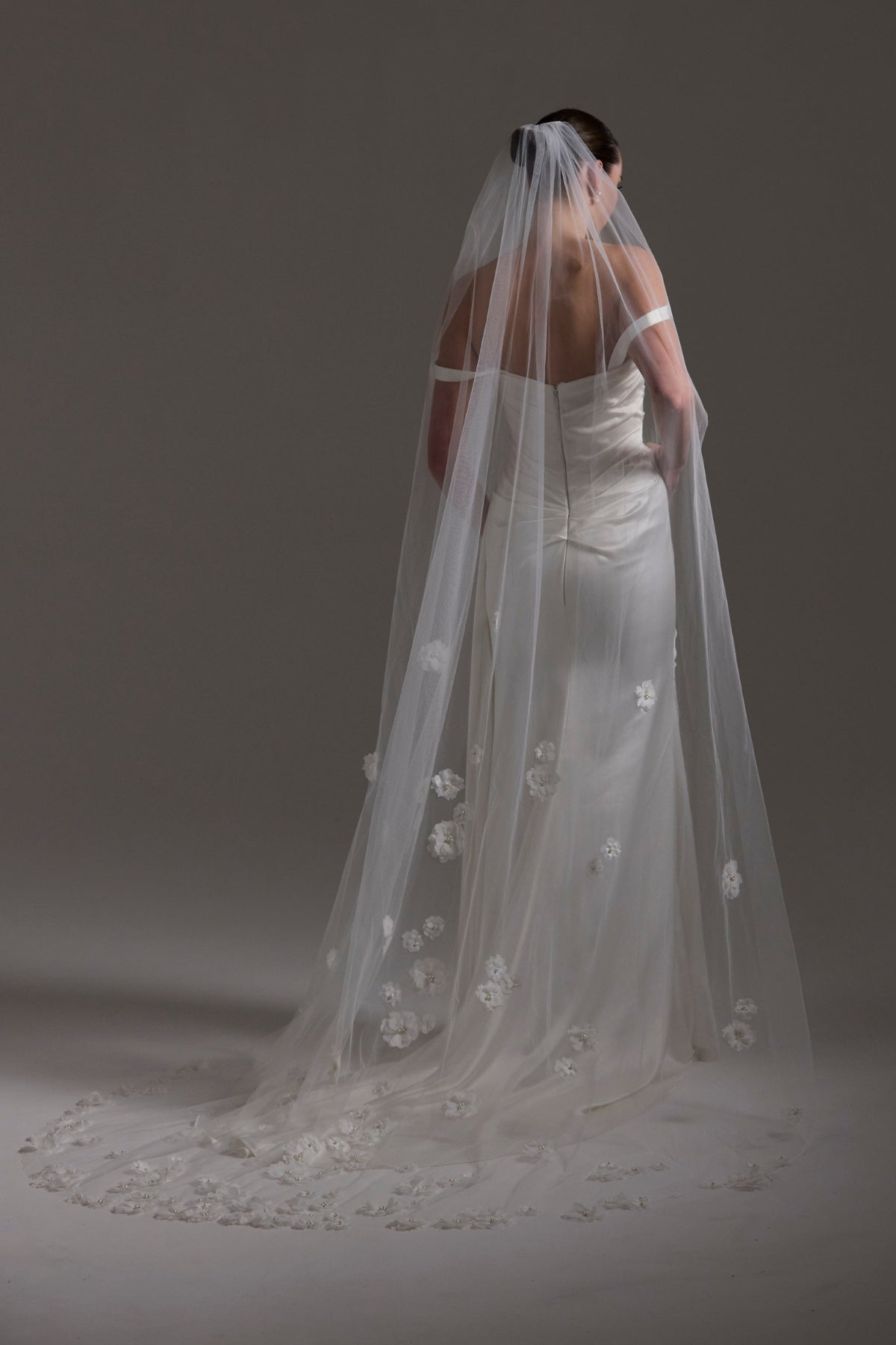Tulle bridal Veil with 3D flowers trailing behind 