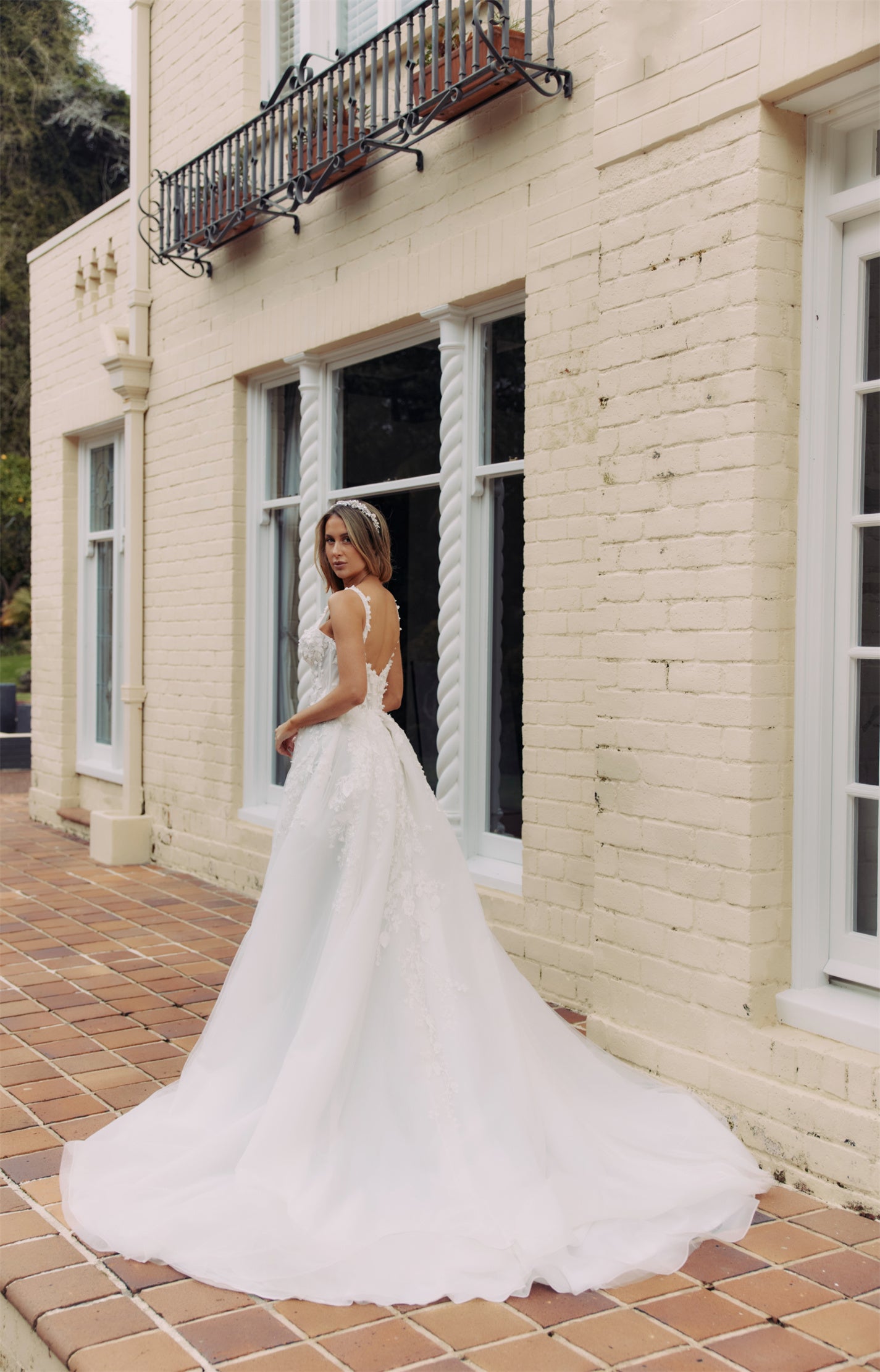 CALYPSO Bridal gown - By Victoria Collection Jessica Couture, featuring an A-line Princess Ballgown covered in delicate leaf lace, Squared neckline and chapel train. 