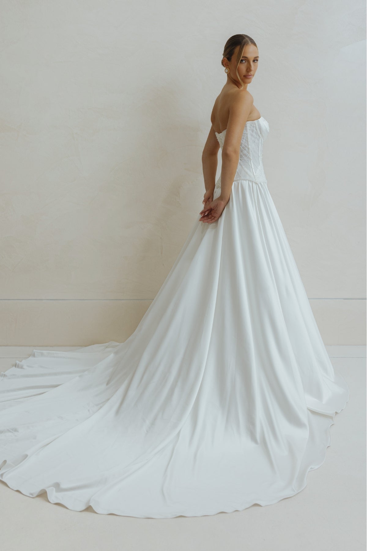two piece Charmeuse A-line wedding gown featuring sweetheart neckline