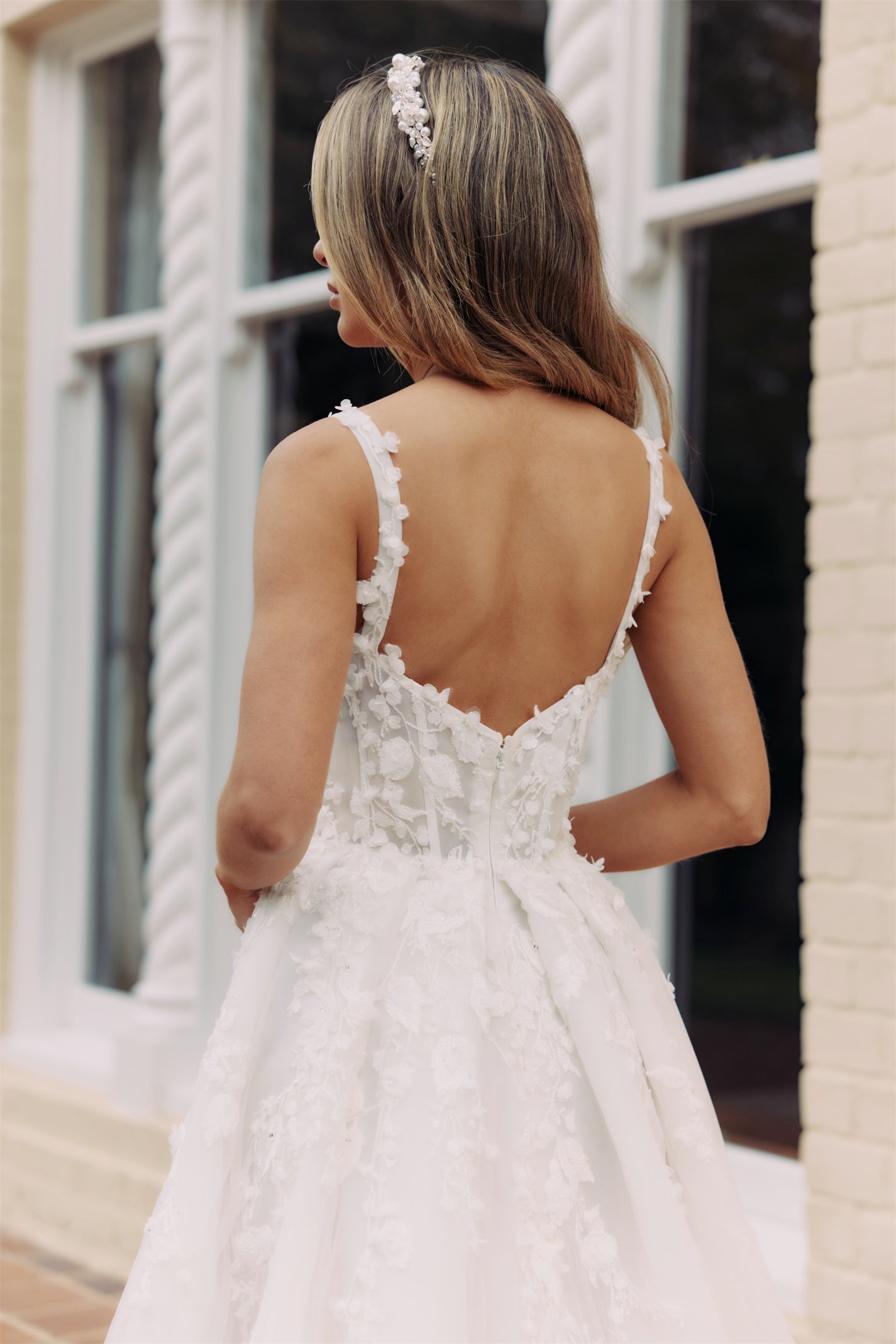 CALYPSO Bridal gown - By Victoria Collection Jessica Couture, featuring an A-line Princess Ballgown covered in delicate leaf lace, Squared neckline and chapel train. 
