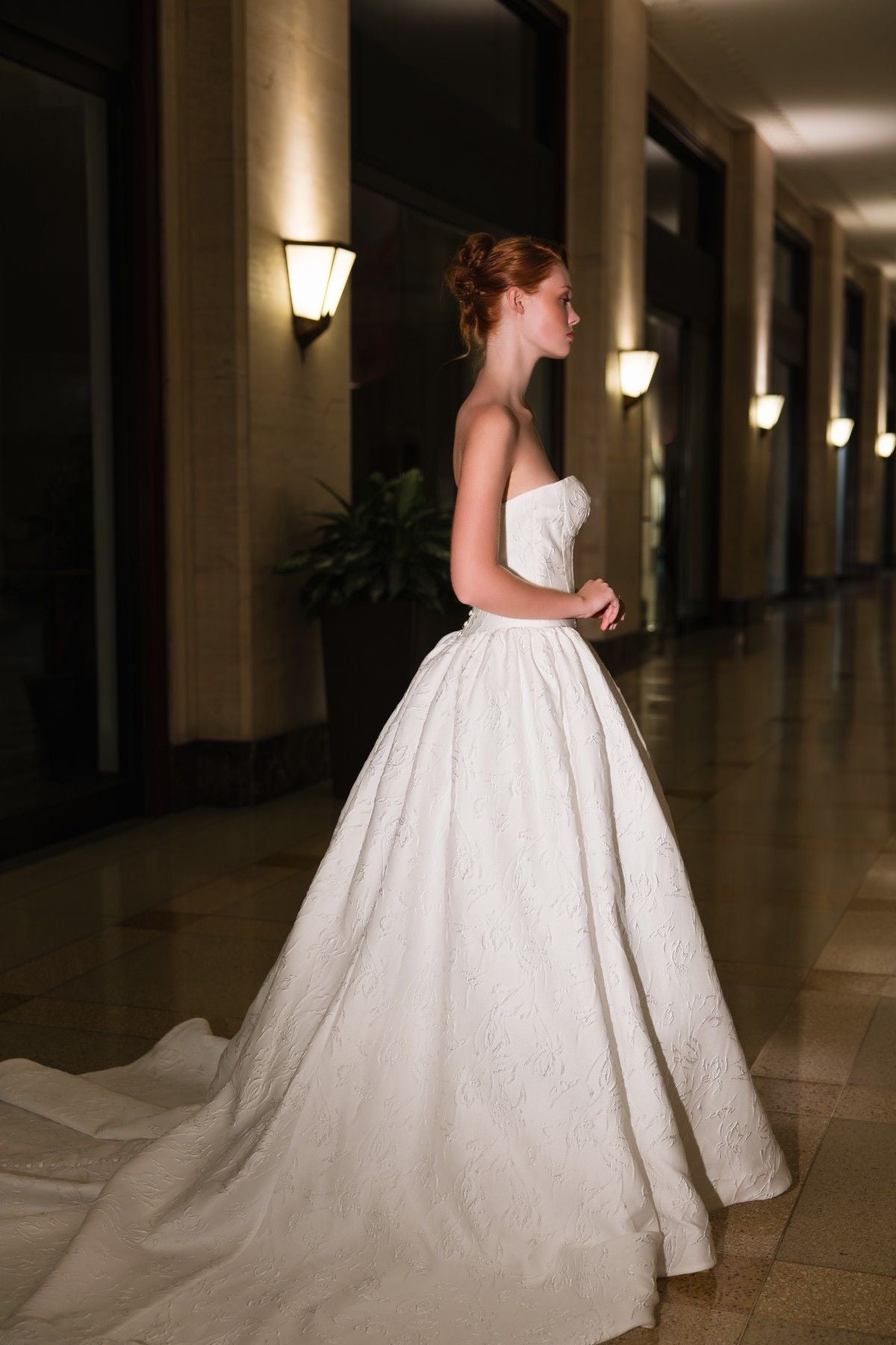 CHRISSY strapless sweetheart jacquard ballgown wedding dress, side view with sweeping train, by Atelier Wu