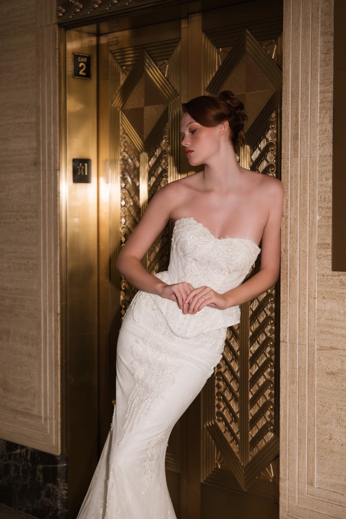 COSETTE strapless beaded lace mermaid wedding dress with peplum waist, three-quarter front view, by Atelier Wu