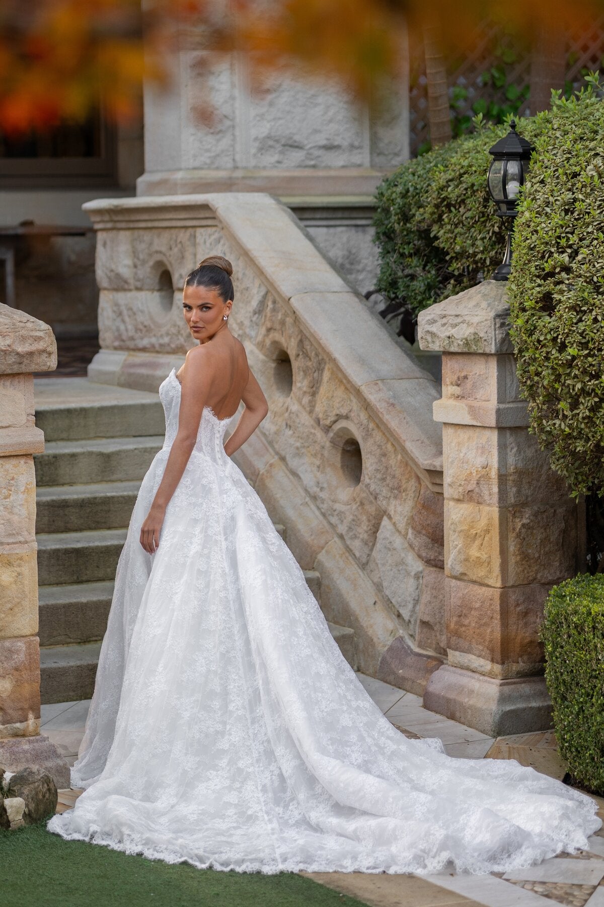 DAHLIA strapless lace A-line wedding dress with corset bodice and floral lace detailing by Jessica Couture