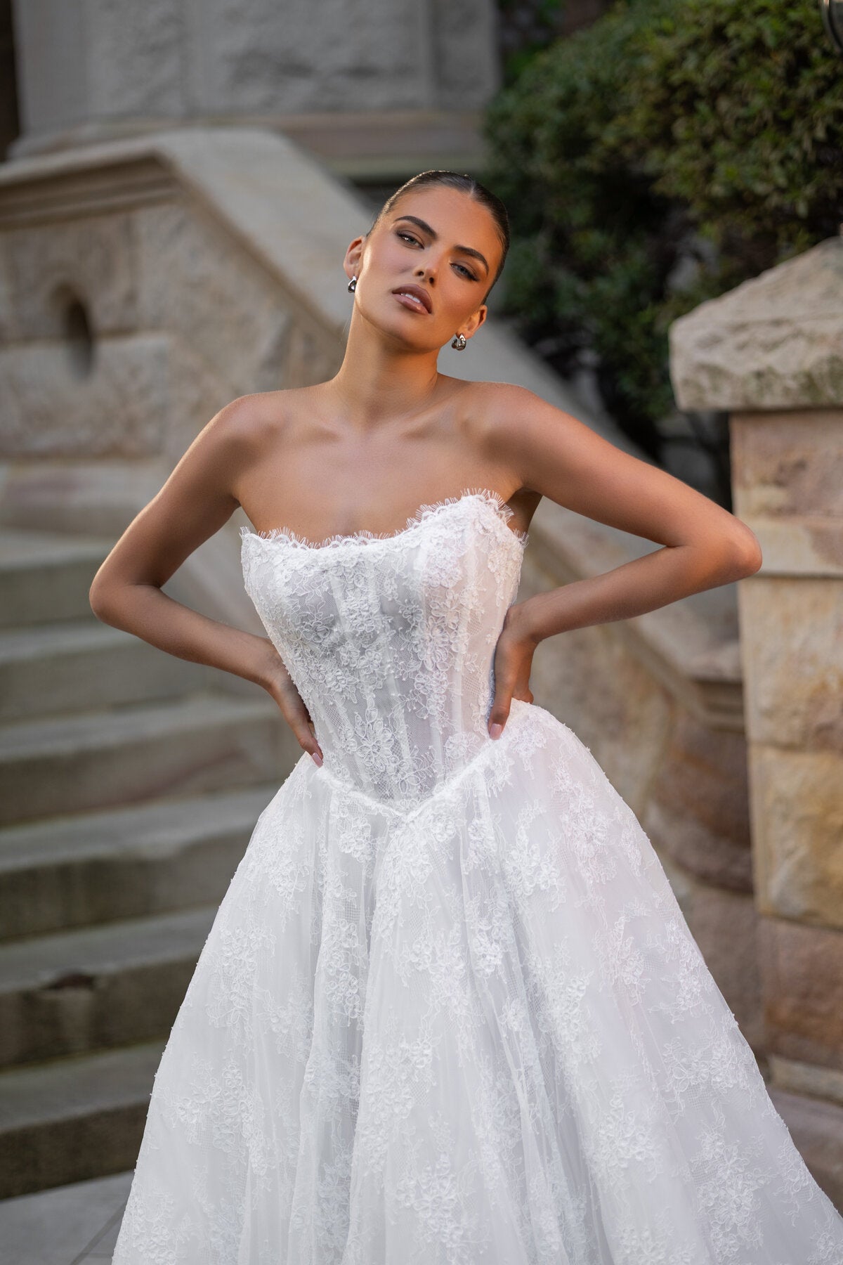 DAHLIA strapless lace A-line wedding dress with corset bodice and floral lace detailing by Jessica Couture