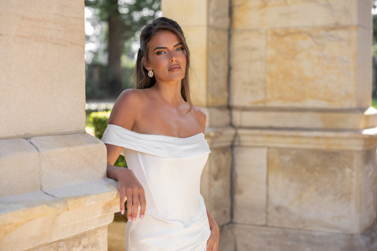 ELENA off-the-shoulder fitted wedding dress with folded neckline and draped waist by Jessica Couture