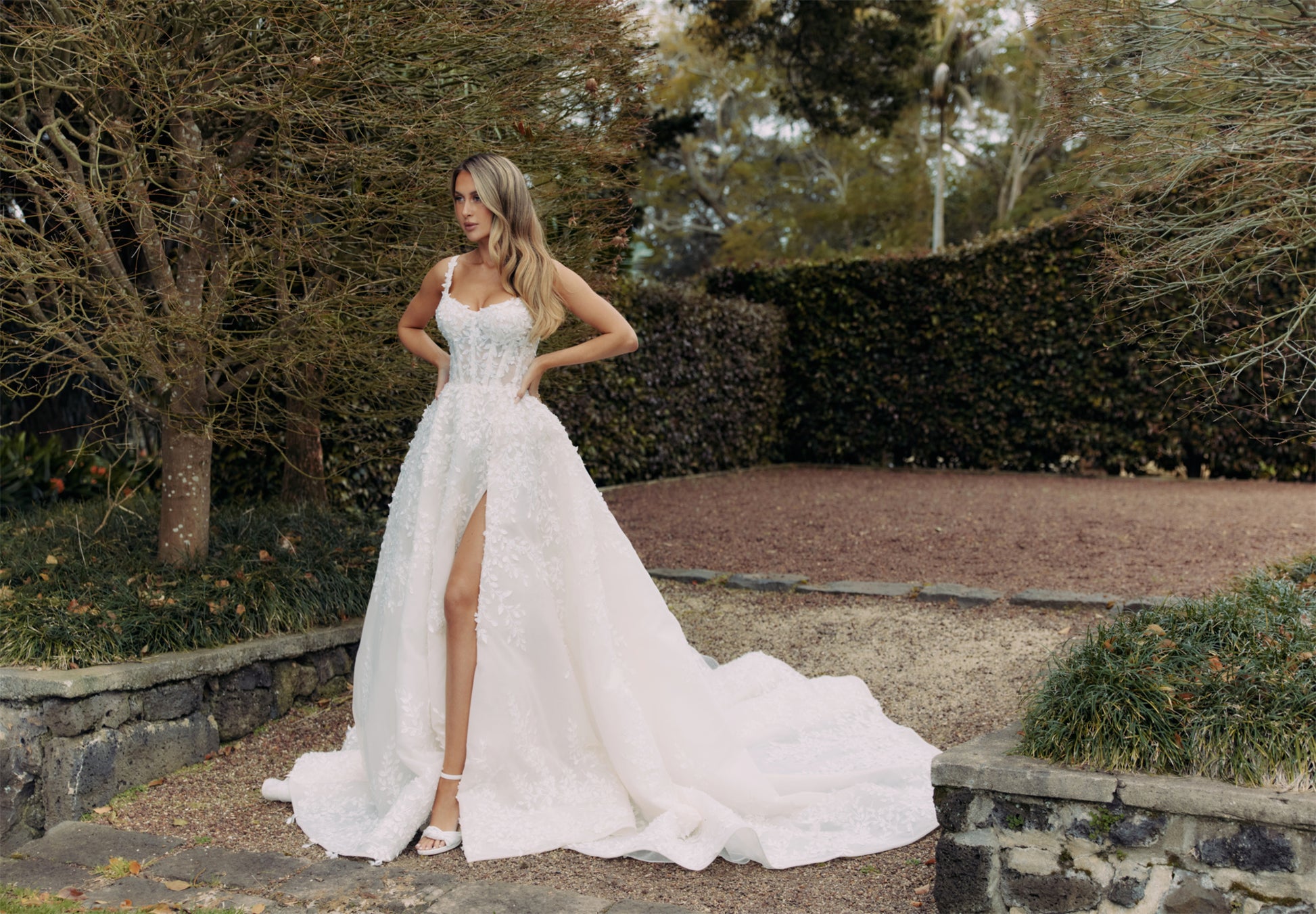 ELISE Bridal Gown - Wedding dress by Victoria Collection Jessica Couture. Featuring an A-line gown with chapel train, and floral lace. 