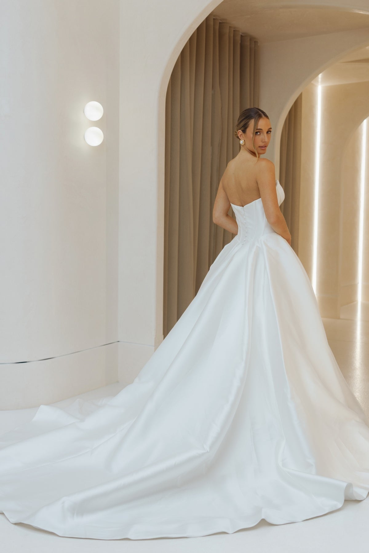 Mikado A-line dress, sweetheart neckline, basque waistline, voluminous skirt.