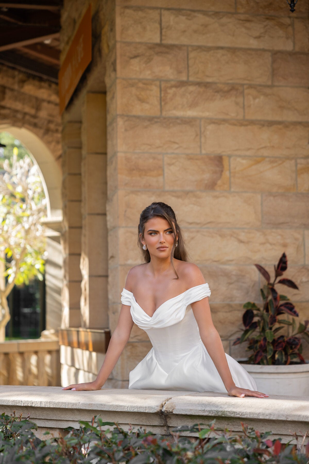 ELLIANA off-the-shoulder satin ball gown wedding dress with draped neckline and structured bodice by Jessica Couture