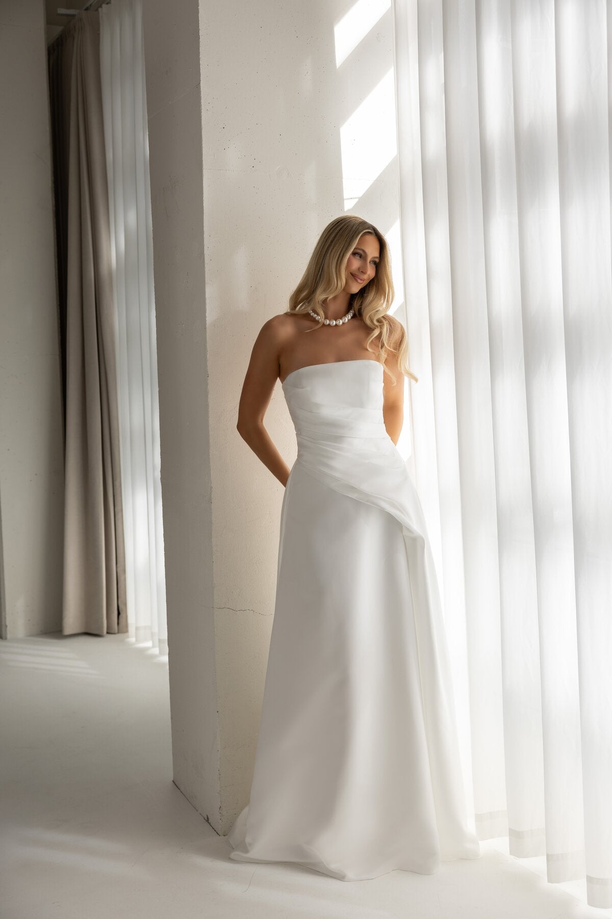 HEIDI strapless A-line satin wedding dress with asymmetric waist drape by Miss Chloe