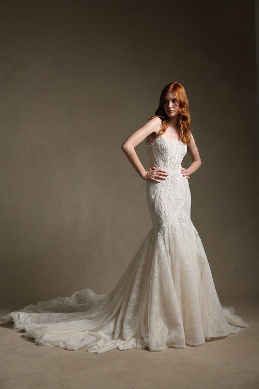 ILARIA square neckline beaded champagne mermaid wedding dress, front view, hands on waist, by Atelier Wu