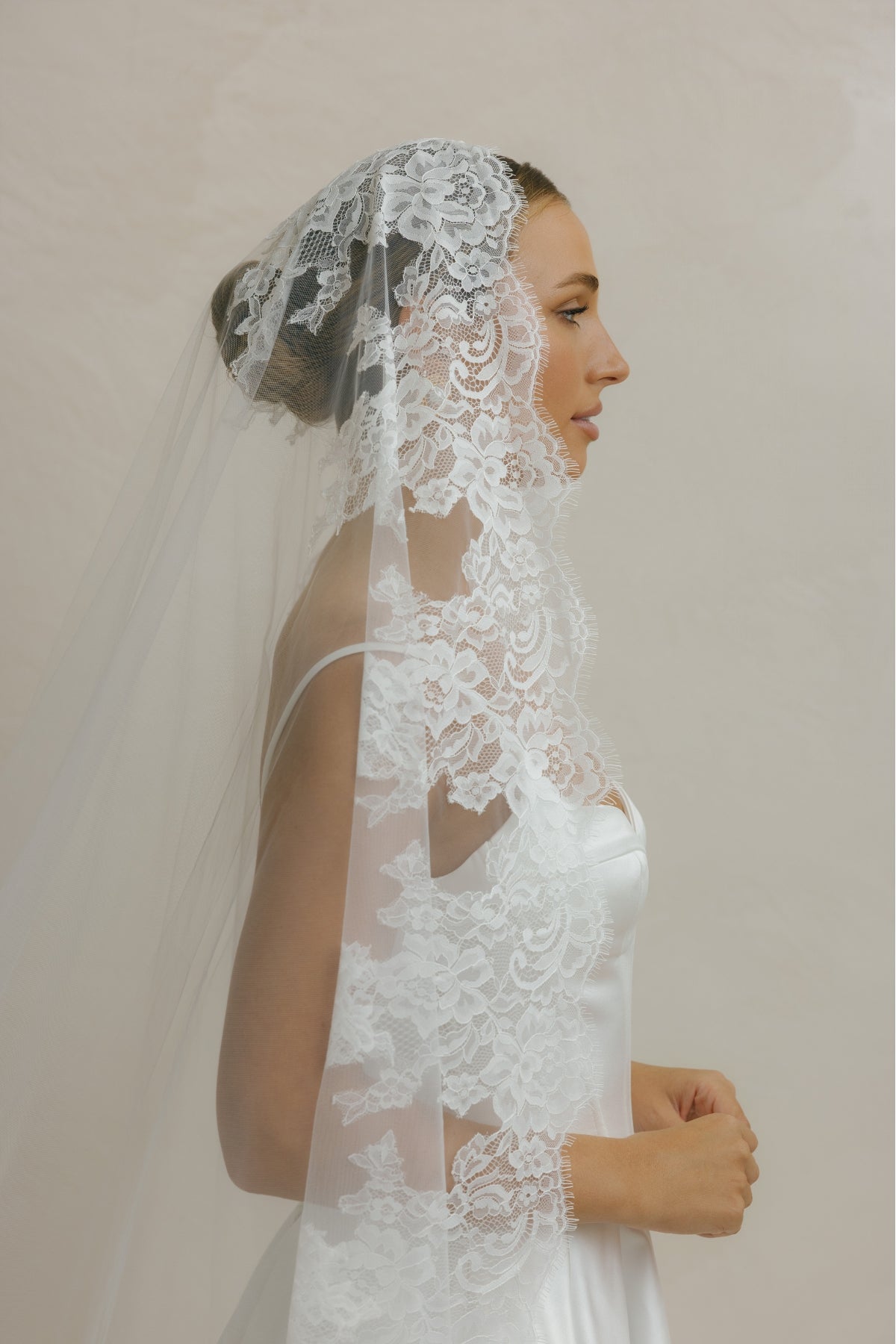 
98 inch Mantilla style, Single tier lace border veil 