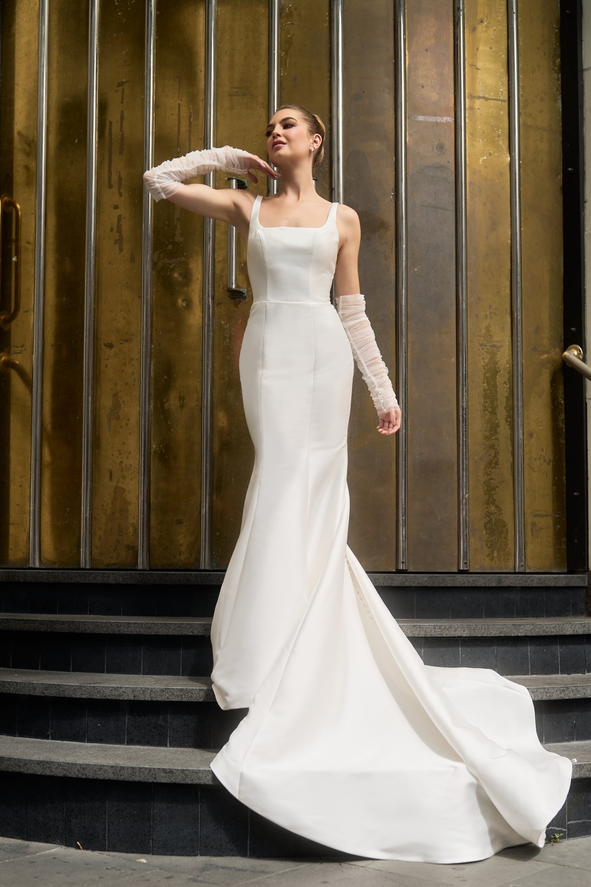 Ricci wedding dress with Ricci detachable sleeves made from gathered tulle and studded with pearl beads.