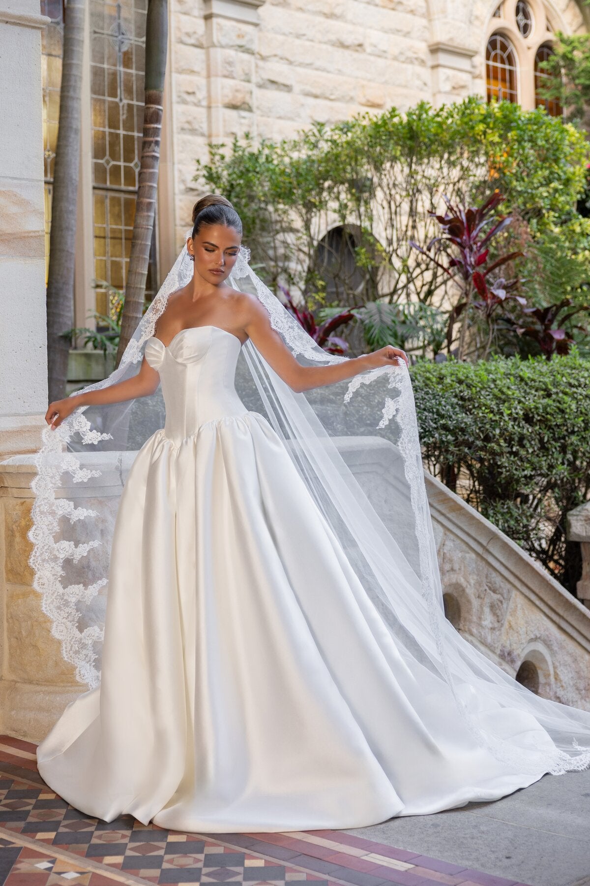MADELYN strapless satin ball gown wedding dress with sculpted bodice and dropped basque waist by Jessica Coutur