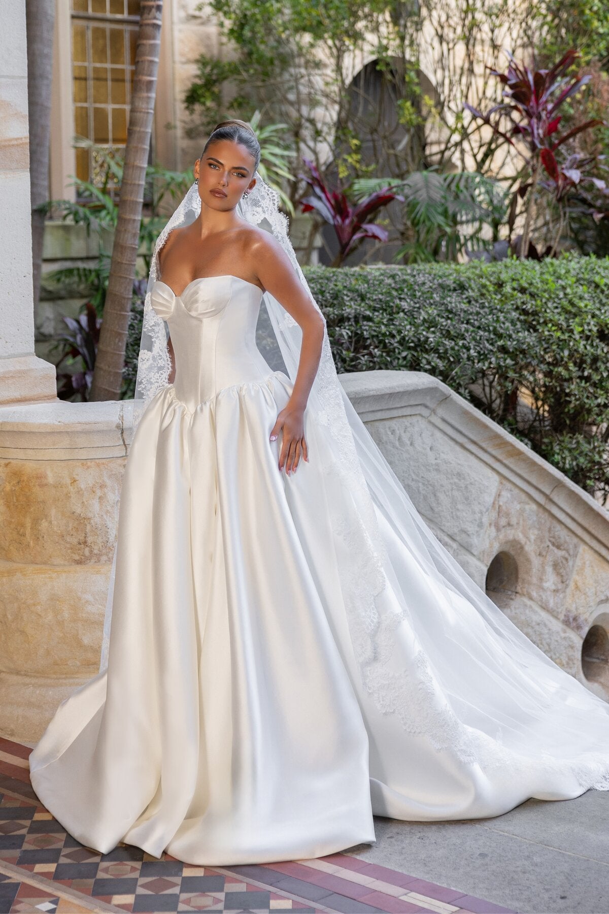 MADELYN strapless satin ball gown wedding dress with sculpted bodice and dropped basque waist by Jessica Coutur