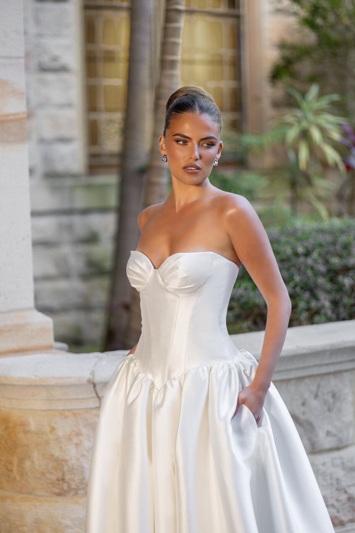 MADELYN strapless satin ball gown wedding dress with sculpted bodice and dropped basque waist by Jessica Coutur