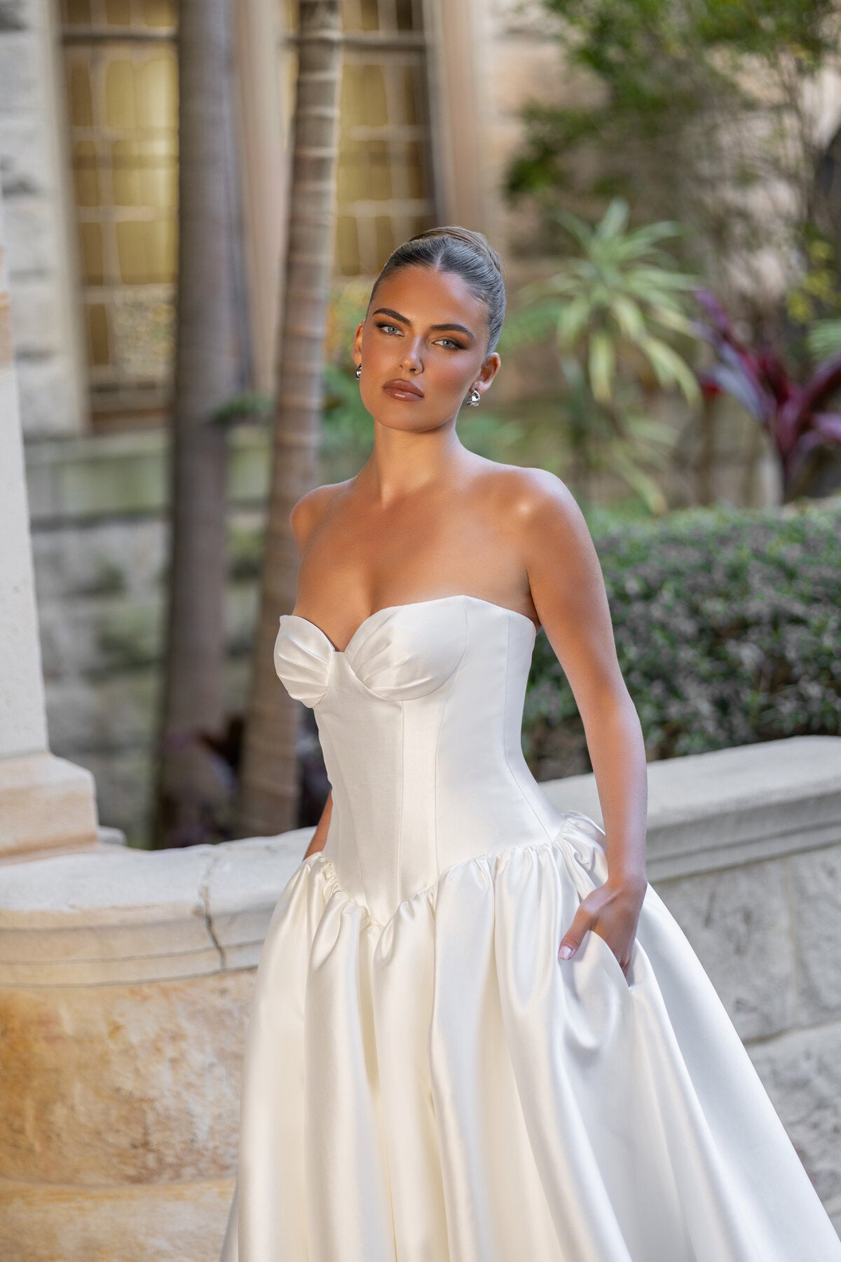 MADELYN strapless satin ball gown wedding dress with sculpted bodice and dropped basque waist by Jessica Coutur