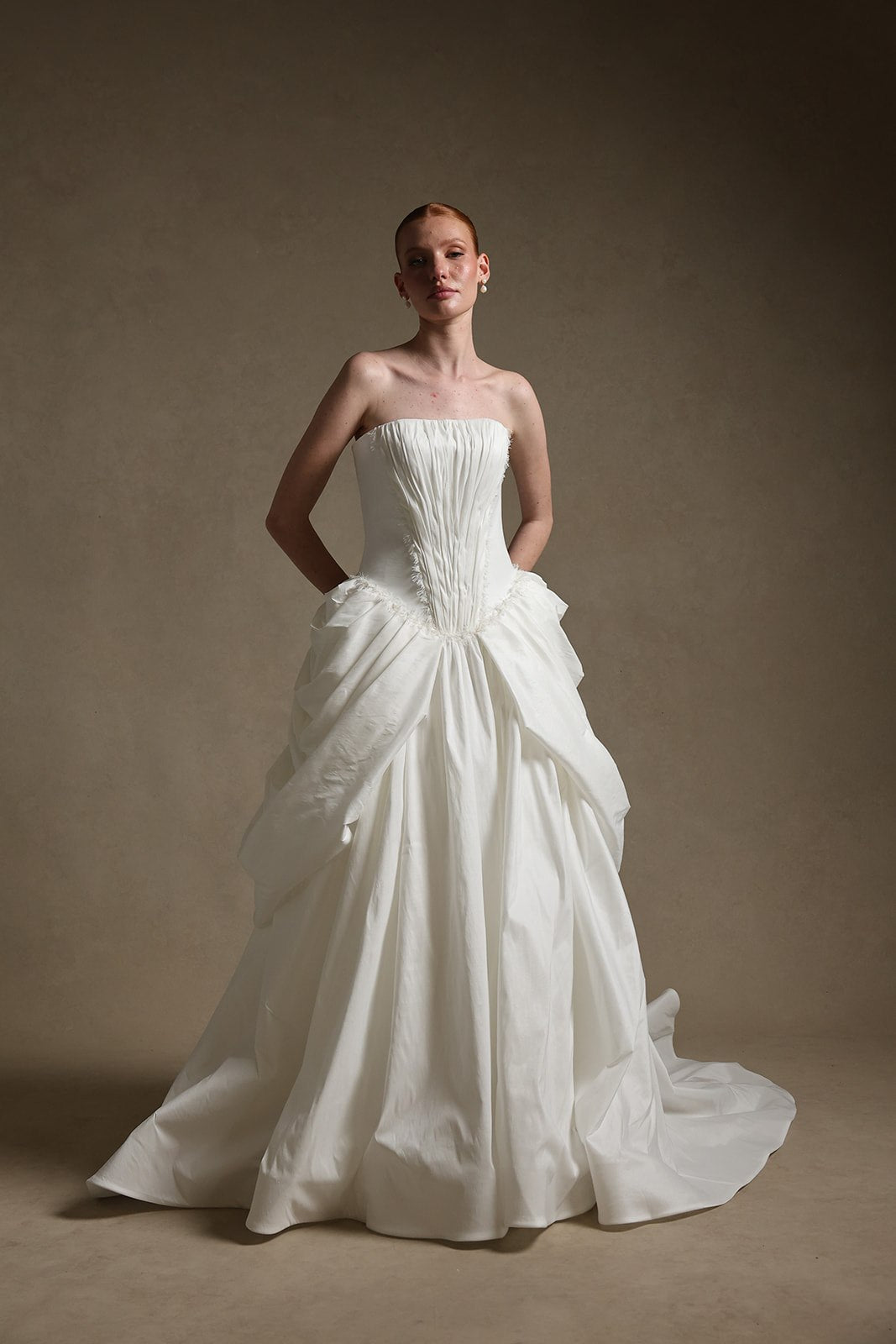 ODELIA strapless taffeta ballgown wedding dress with pintucked bodice and draped pick-up skirt by Atelier Wu
