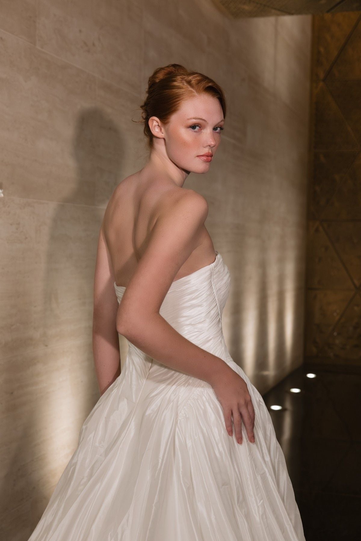 RHEA strapless sweetheart textured taffeta A-line wedding dress, side view of the bodice, by Atelier Wu