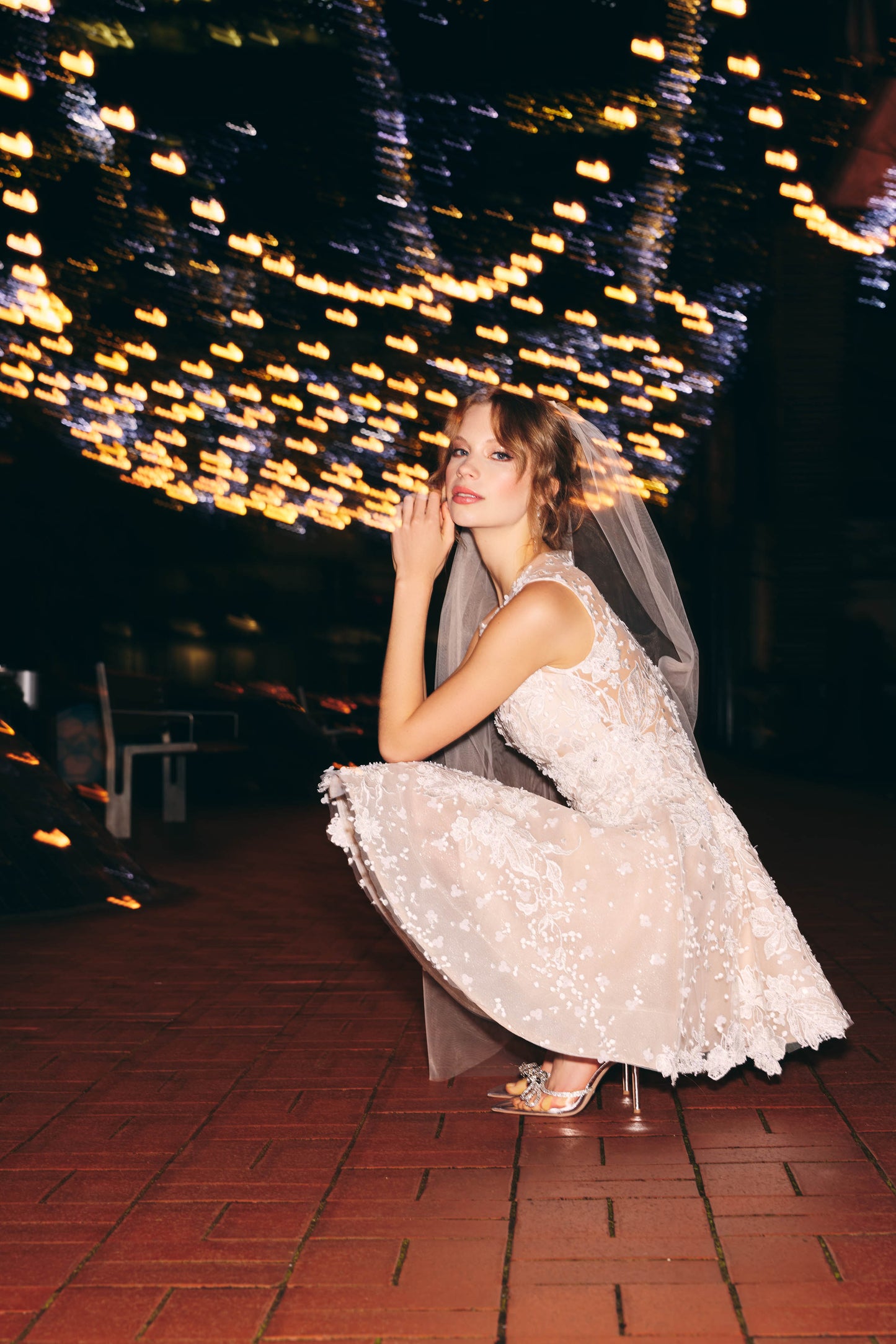 Mini Bridal dress featuring an llusion mesh V plunge neckline, A line skirt with floral lace. 