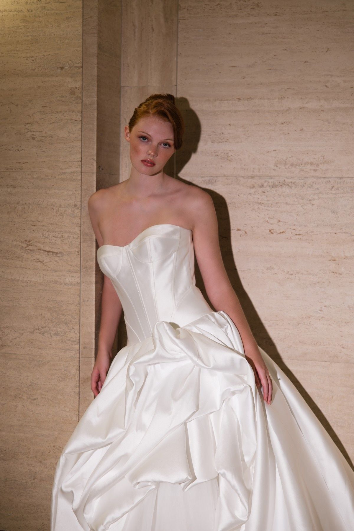 SIDONIE strapless sweetheart mikado ballgown wedding dress with draped pick-up skirt, front view of the draped skirt, by Atelier Wu