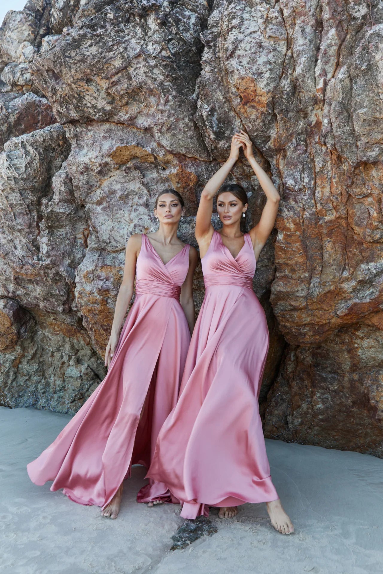Sakura bridesmaid gown with wide shoulder straps and ruched band under the waist. Cross over neckline with full-length split skirt from wiastline
