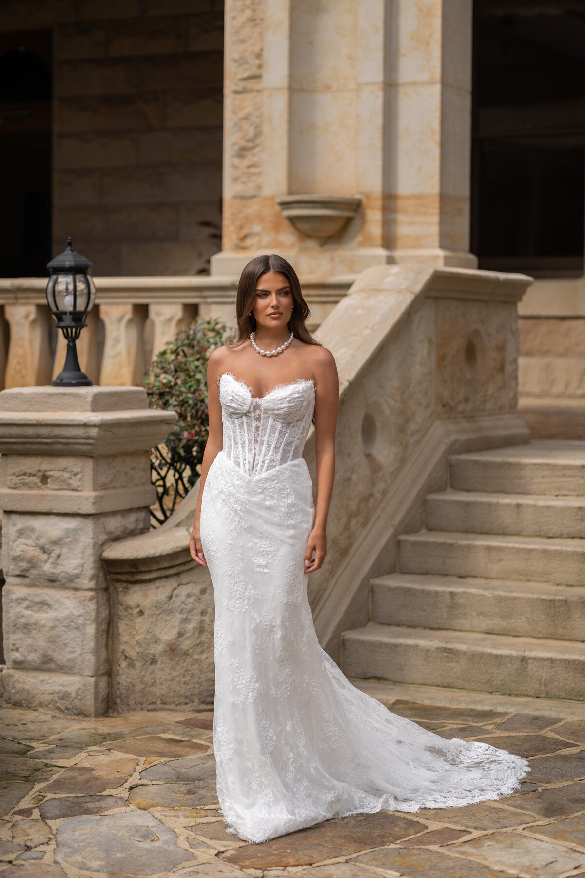 TYNISHA lace fit-and-flare wedding dress with sweetheart neckline, sheer corset bodice and basque waist by Jessica Couture