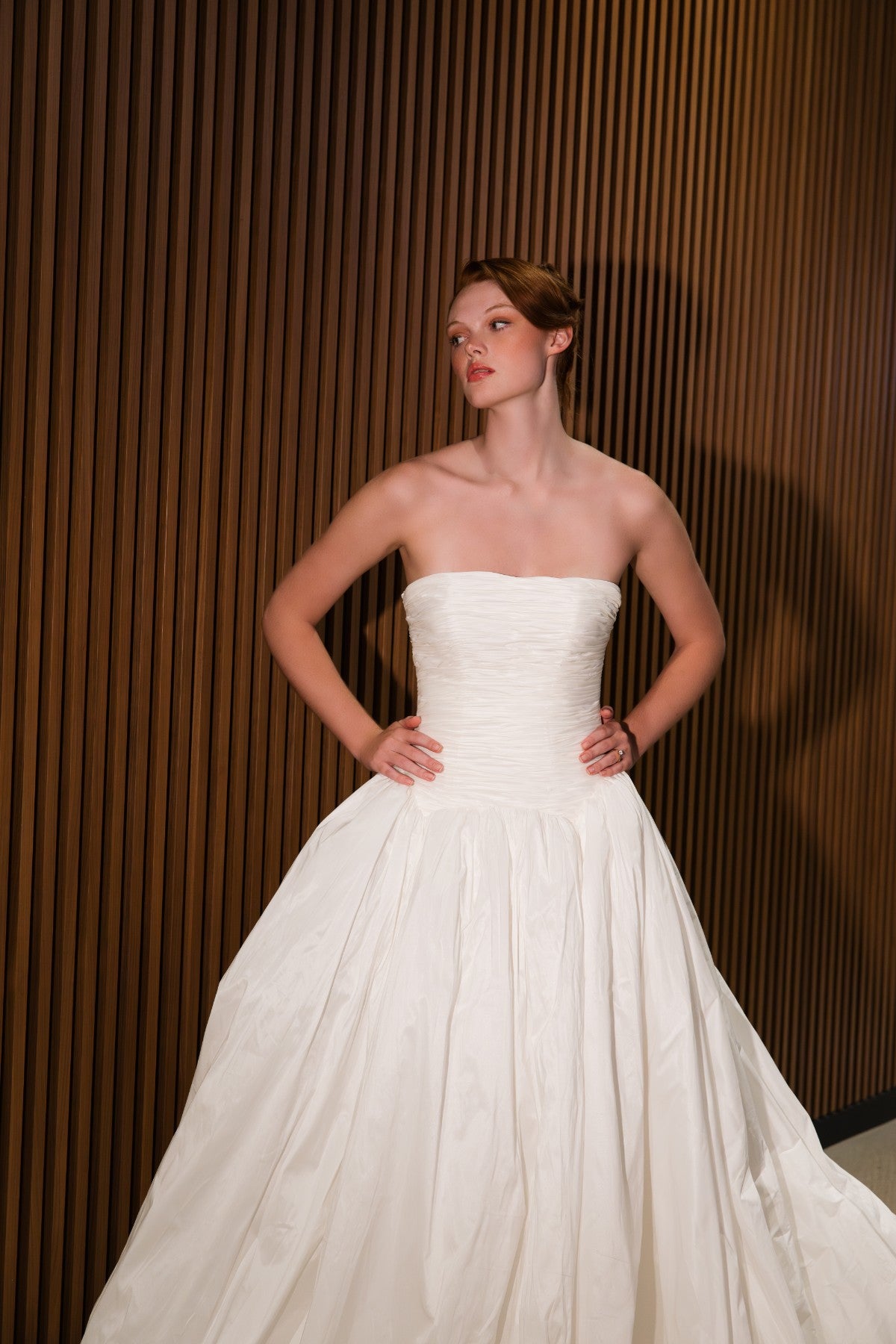 VENELOPE strapless taffeta ballgown wedding dress with shirred bodice, front view of the full skirt, by Atelier Wu