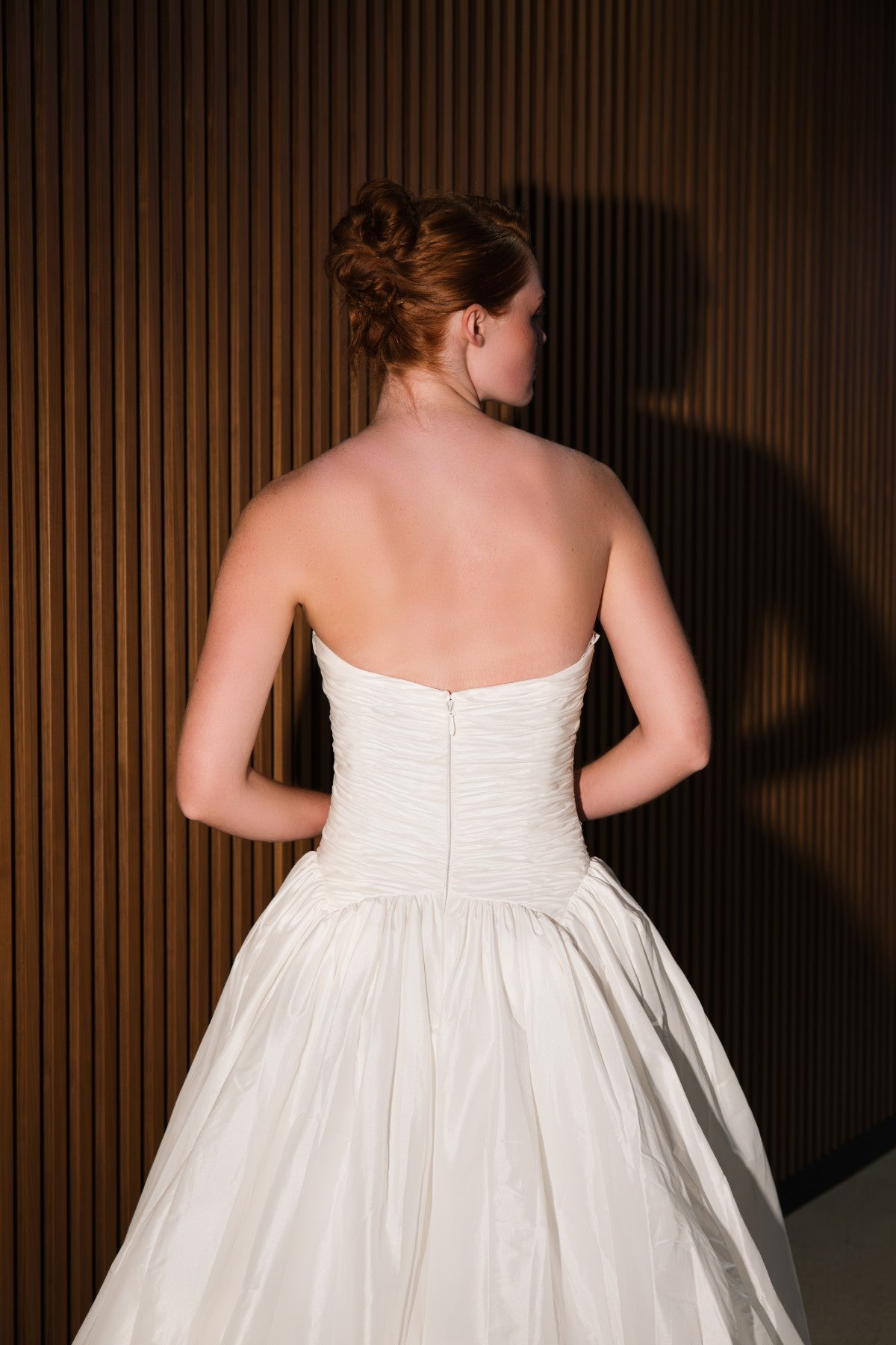 VENELOPE strapless taffeta ballgown wedding dress with shirred bodice, back view, by Atelier Wu