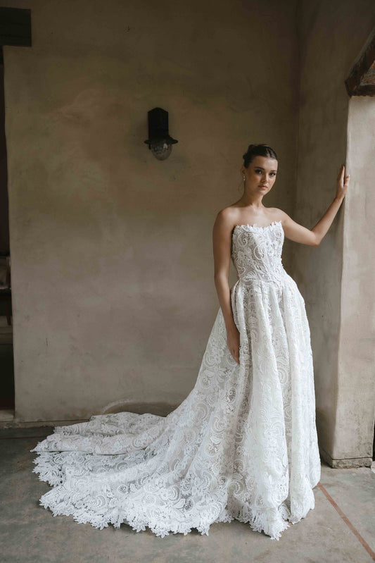 Vogue Gown – Full lace A-line ballgown with a cat-eye corseted bodice and subtle boning. By Roselle Collection, Jessica Couture.