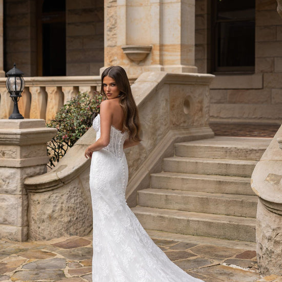 TYNISHA lace fit-and-flare wedding dress with sweetheart neckline, sheer corset bodice and basque waist by Jessica Couture