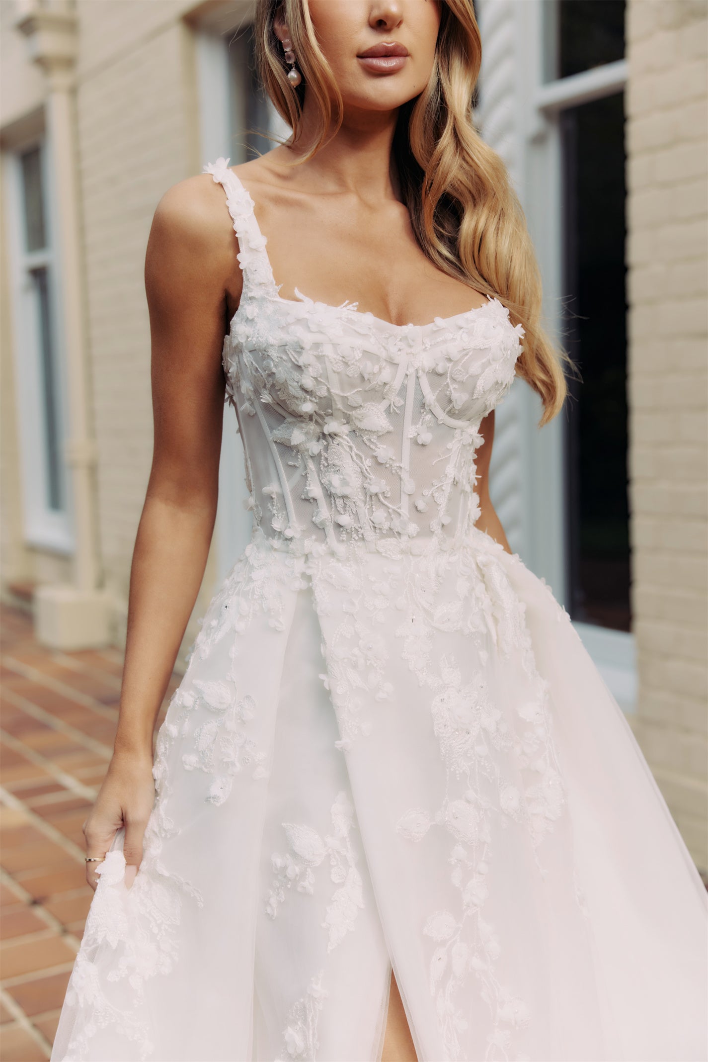 CALYPSO Bridal gown - By Victoria Collection Jessica Couture, featuring an A-line Princess Ballgown covered in delicate leaf lace, Squared neckline and chapel train. 