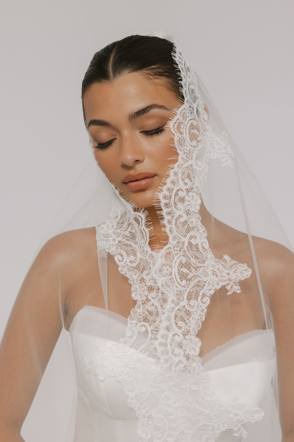 A-line wedding gown with double cups feature, modern, minimal and flowy. 