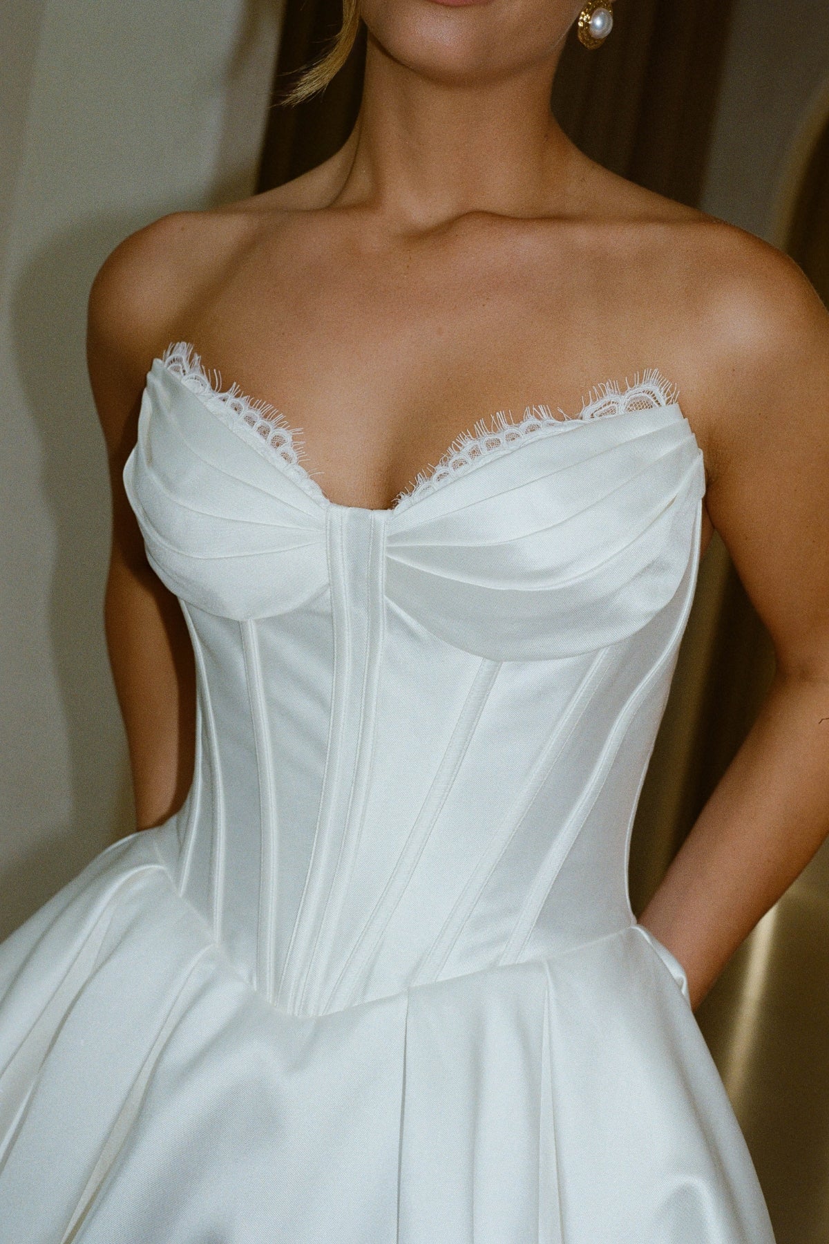 Mikado A-line dress, sweetheart neckline, basque waistline, voluminous skirt.