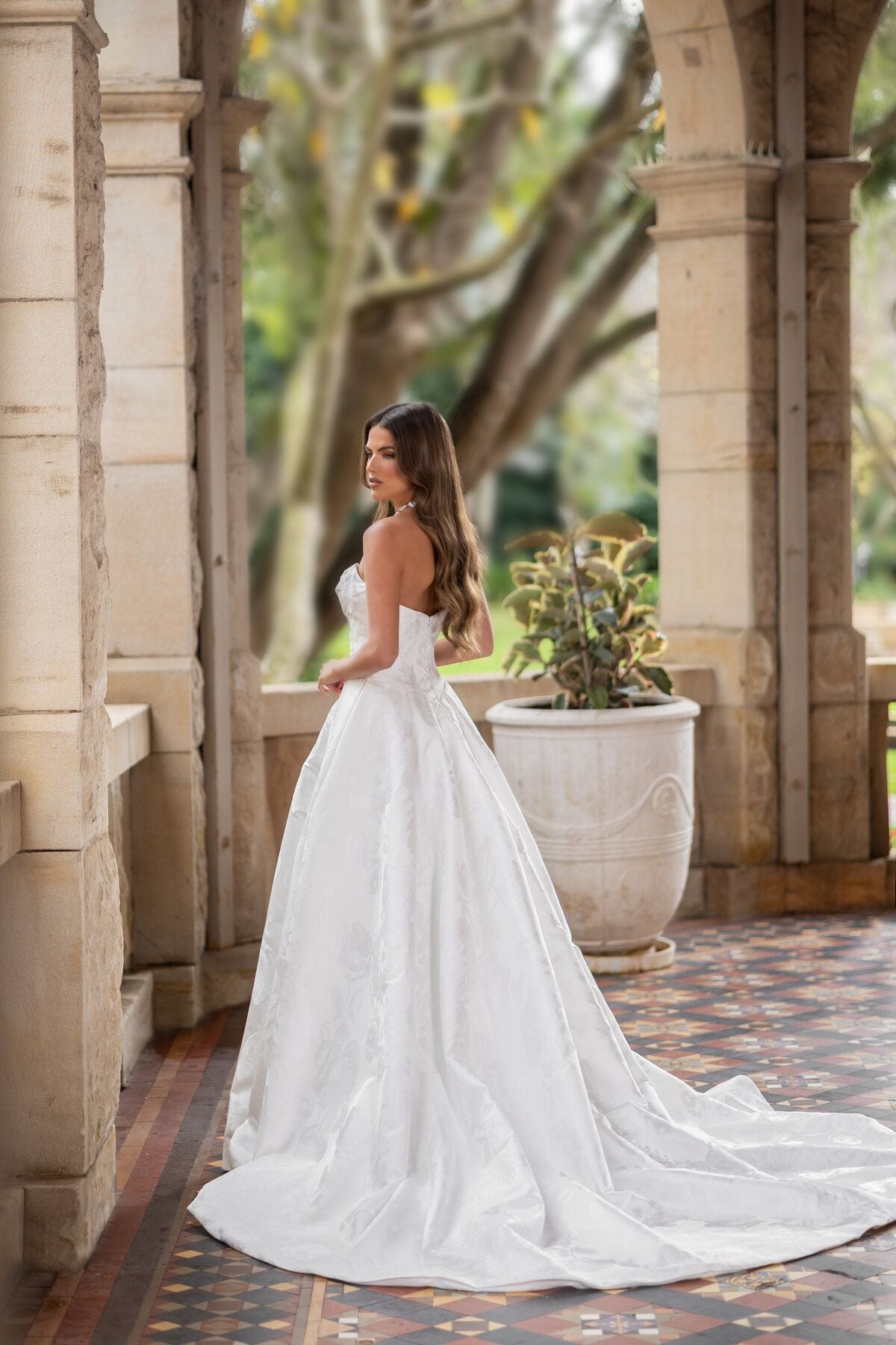 ATLANTA strapless floral jacquard A-line wedding dress with draped bodice and high leg slit by Jessica Couture