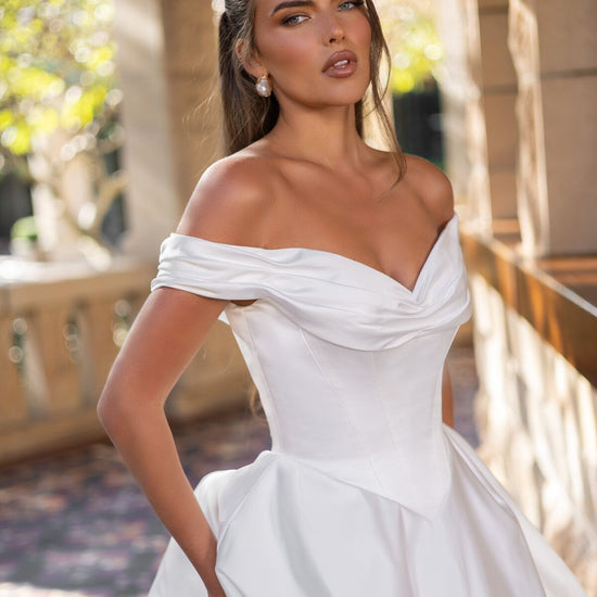 ELLIANA off-the-shoulder satin ball gown wedding dress with draped neckline and structured bodice by Jessica Couture
