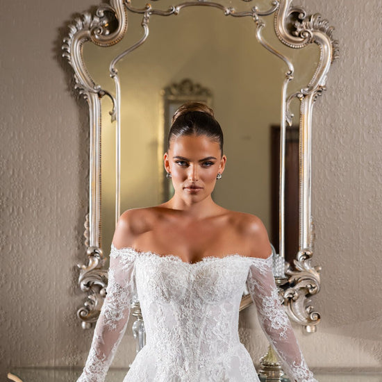 ISADORA off-the-shoulder lace wedding dress with long sleeves, sweetheart neckline and corset bodice by Jessica Couture
