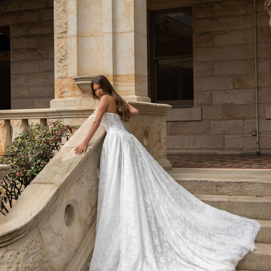 VELYN strapless lace ball gown wedding dress with sweetheart bodice and pearl detailing by Jessica Couture
