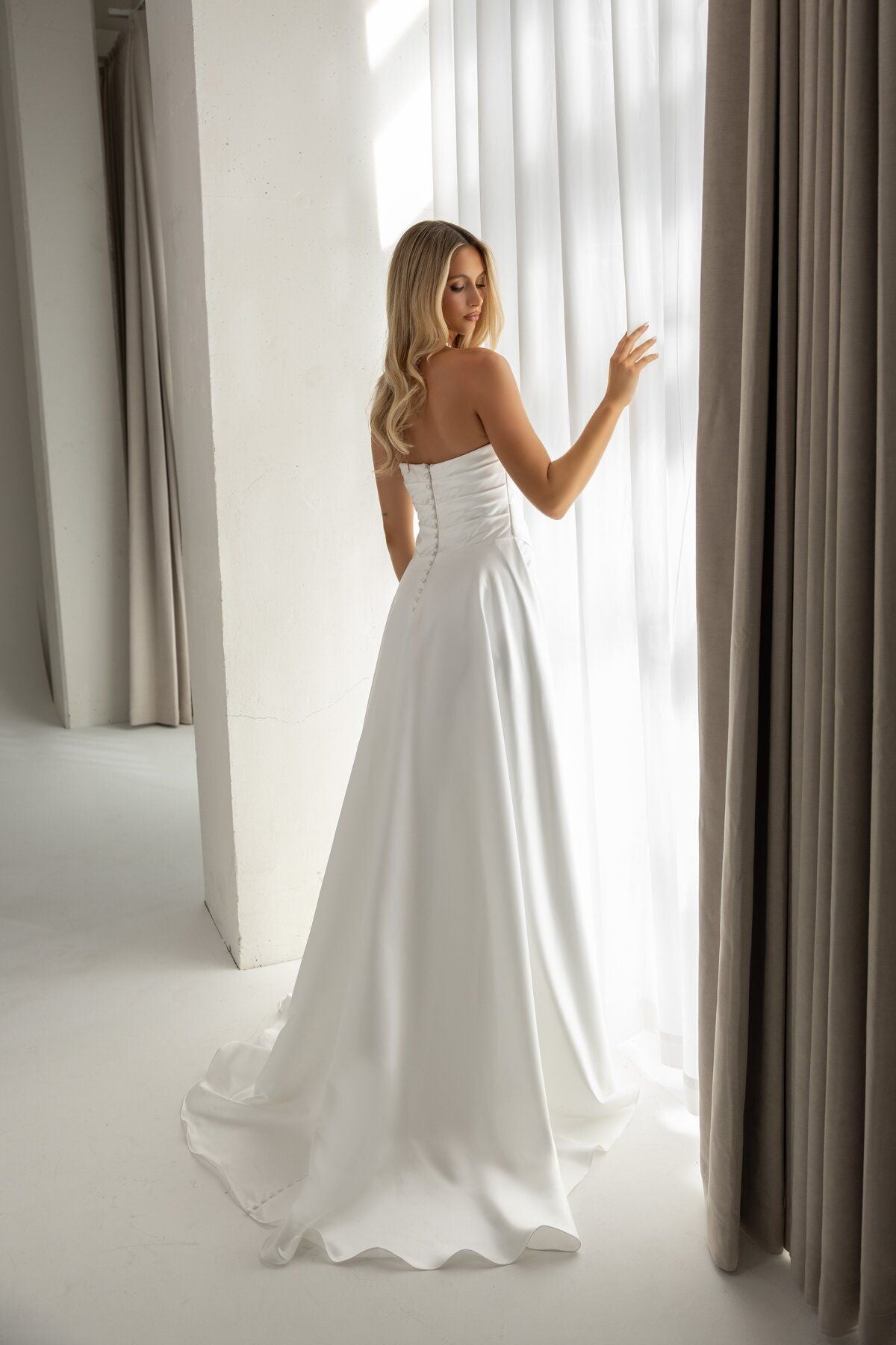 HEIDI strapless A-line satin wedding dress with asymmetric waist drape by Miss Chloe