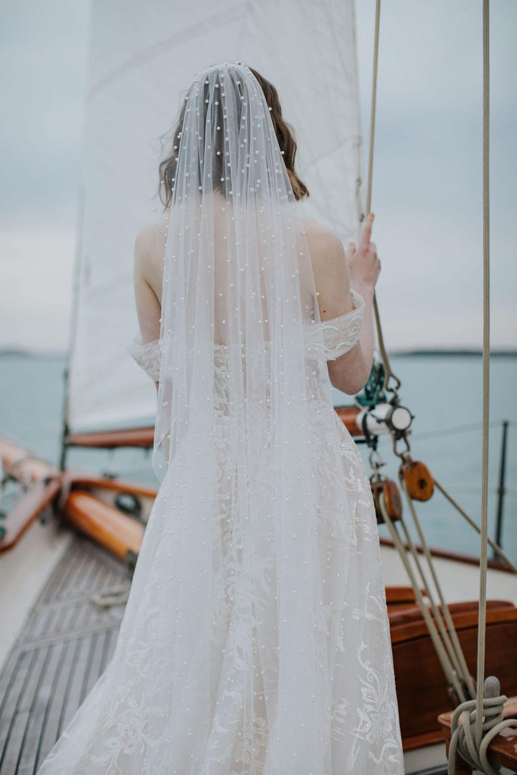 Back view of pearl Oli veil with Oli dress