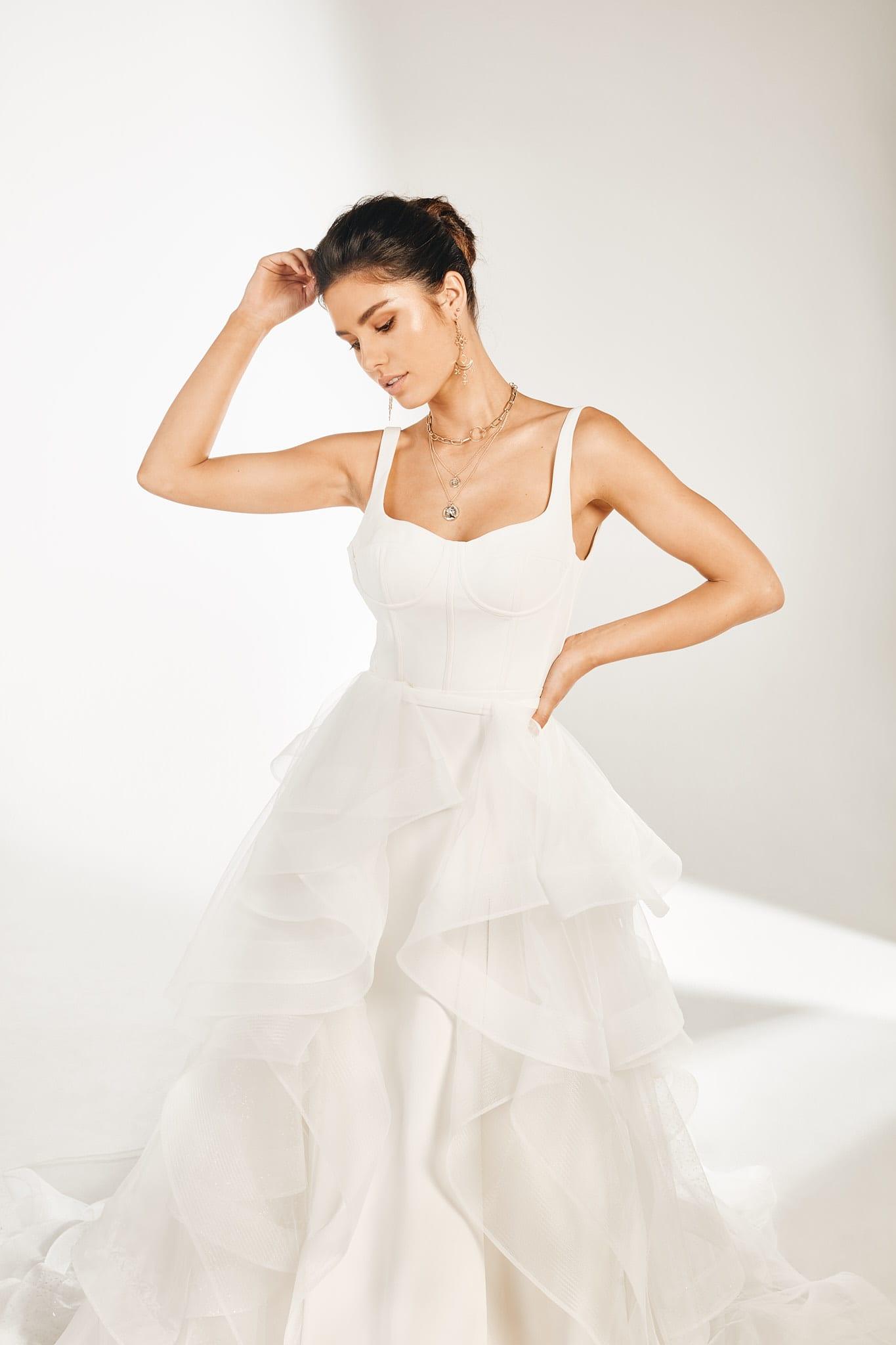 Mid-shot of Olivia overskirt from the front showing the tulle ruffles fall down the gown