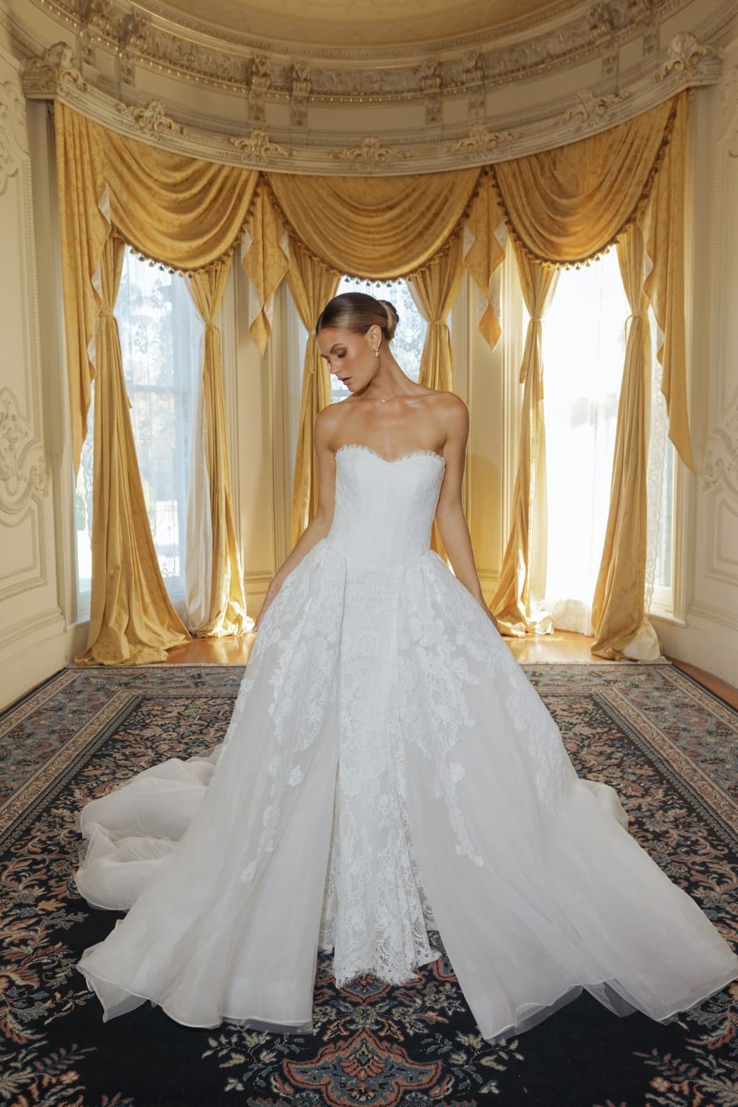 A bride in a Jessica Couture gown